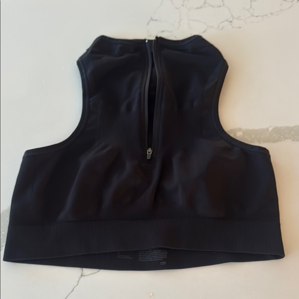 Black Zella Body Sports Bra Top with high neck and zipper detail, Racer back